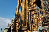 Bangkok Grand Palace, the Wat Phra Keow (temple of the Emerald Buddha), yakshas door guardians of the Phra Mondop library. 